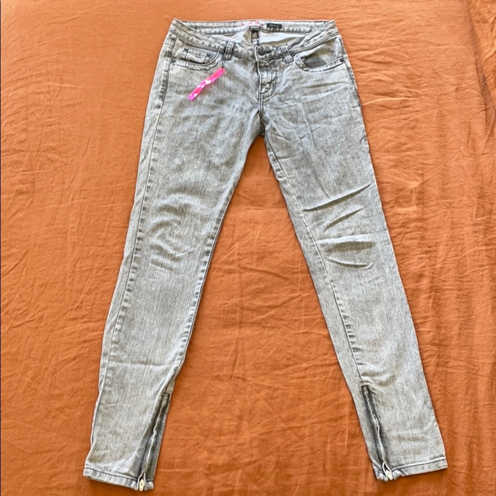 Lux cigarette low rise jeans with bottom zips